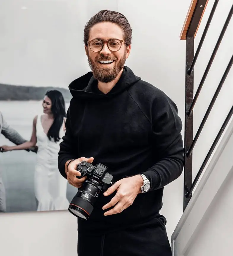 a person holding a camera