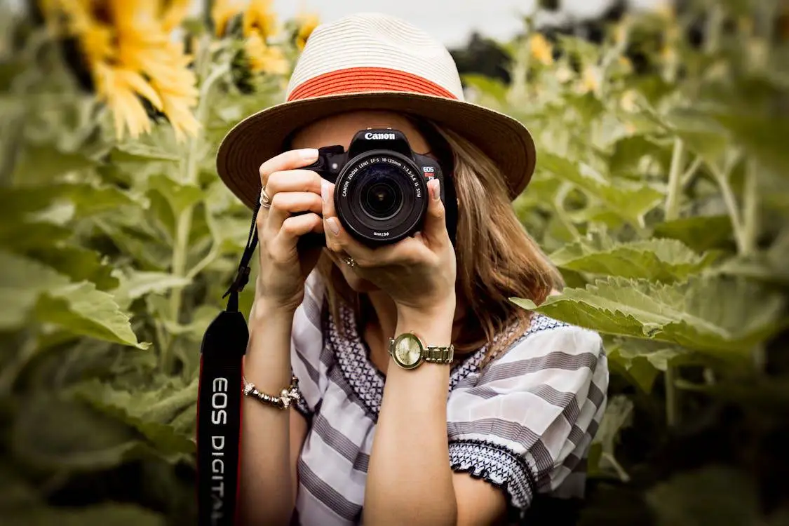 a person holding a camera